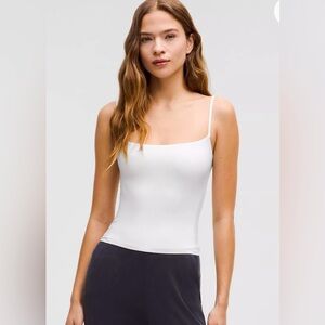Lululemon white tank top. Spaghetti strap brand new with tags!